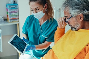 Dentist showing patient his X-ray results