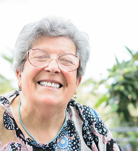 Woman smiling outside