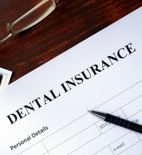 Dental insurance paperwork on a desk