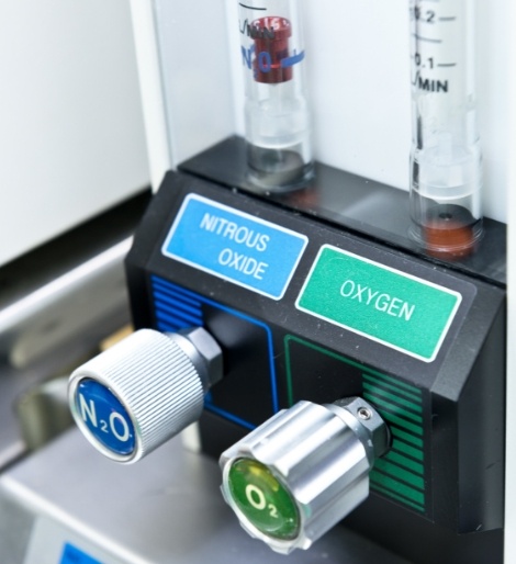 Machine in dental office with buttons labeled oxygen and nitrous oxide